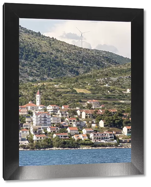 Croatia. Seget Vranjica on Dalmatian Coast near Trogir. Windmill turbine