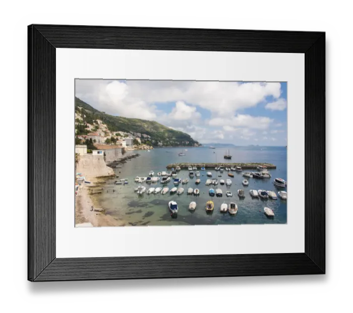 Framed Print : Croatia, Dubrovnik. View of marina and coastline from old city wall
