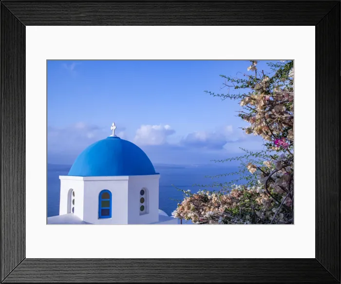 Framed Print : Blue domed Greek Orthodox church with bougainvillea flowers in Oia, Santorini, Greece Framed Print : Blue domed Greek Orthodox church with bougainvillea flowers in Oia, Santorini, Greece
