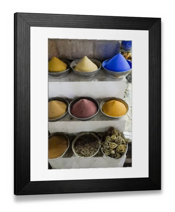 Framed Print : Spice vendor at the Souk at night. The blue container is bluing used to whiten white