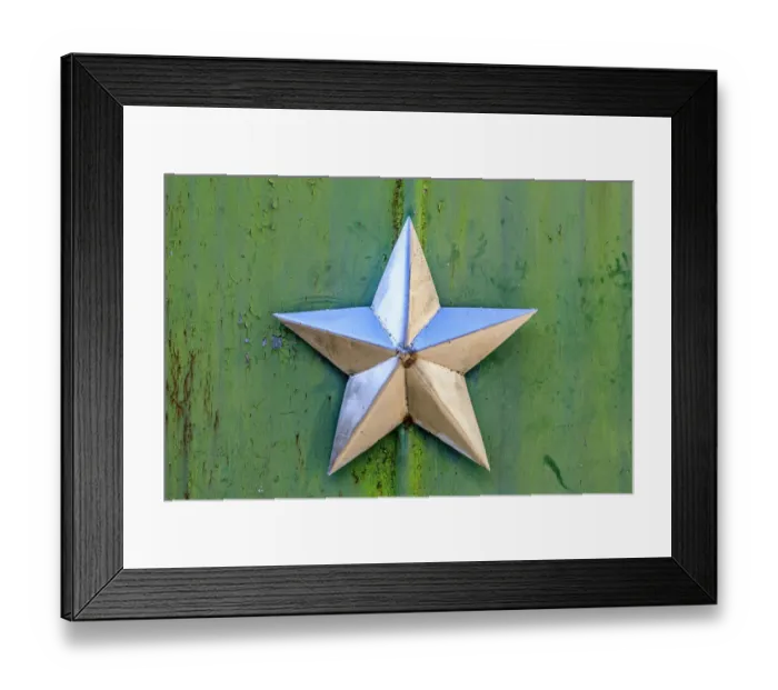 Framed Print : Ukraine, Pripyat, Chernobyl. Decorative silver Soviet star on a green wall
