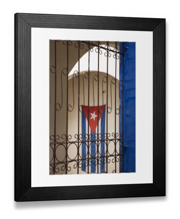 Framed Print : Cuba, Vinales, Cuban flag in courtyard and wrought iron gate