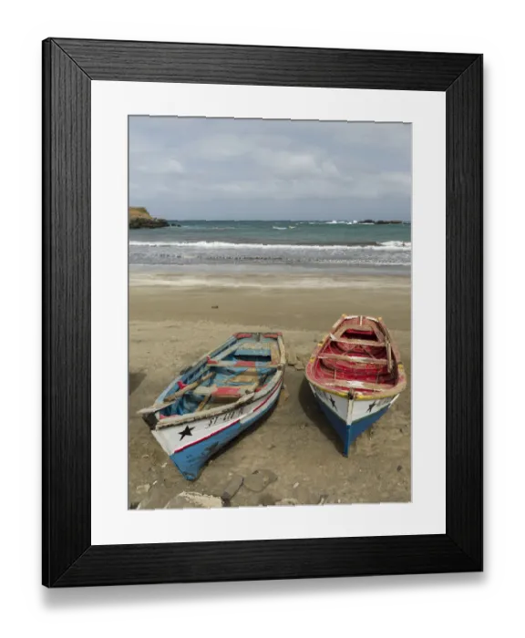 Framed Print : Traditional fishing boats on the beach of Praia Baixo. Santiago Island