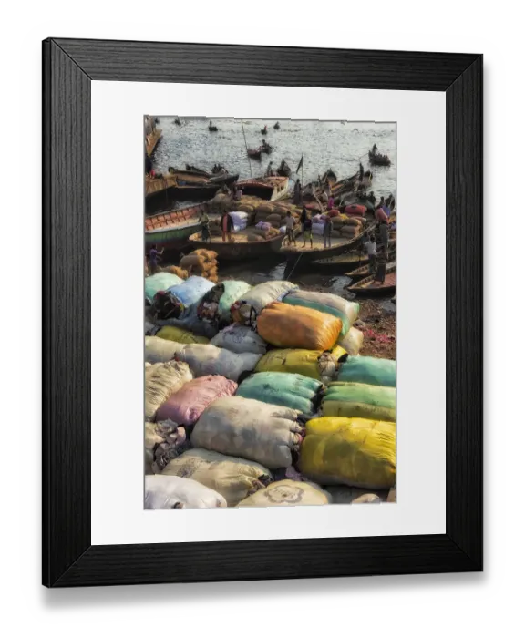 Framed Print : Loading sacks onto ferry boats on Buriganga River at Sadarghat (City Wharf) Framed Print : Loading sacks onto ferry boats on Buriganga River at Sadarghat (City Wharf)