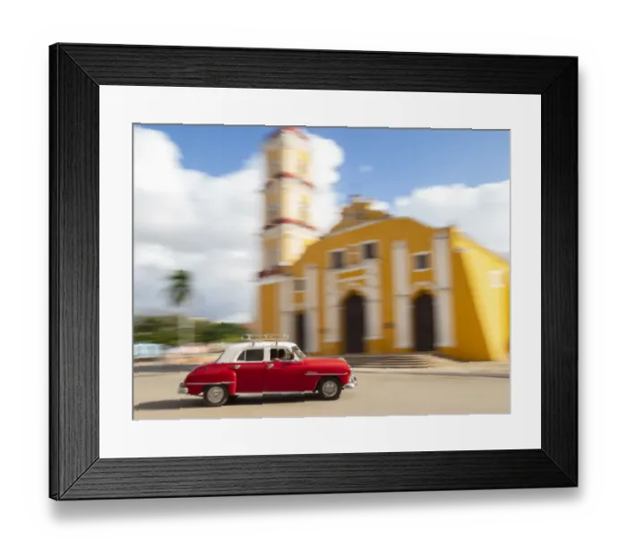 Framed Print : Cuba, Remedios, classic red car in front of Cathedral