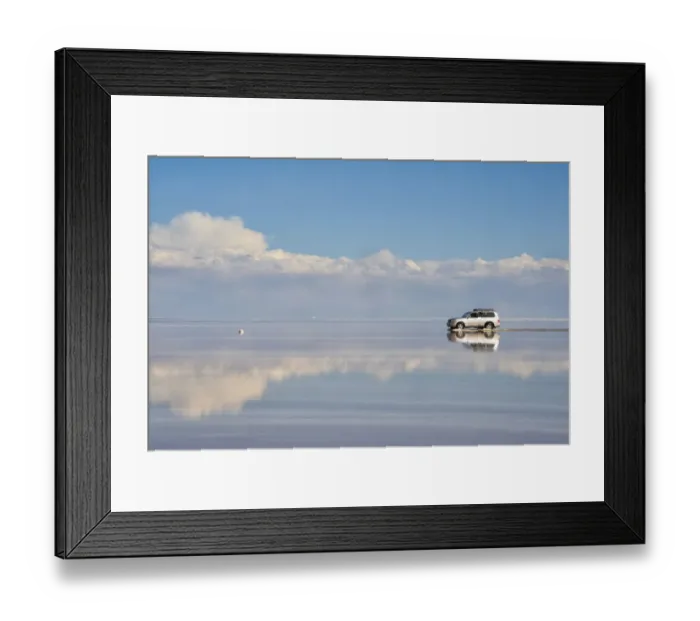 Framed Print : Jeep driving on the reflected surface of the salt flat, Salar de Uyuni, Potosi Department Framed Print : Jeep driving on the reflected surface of the salt flat, Salar de Uyuni, Potosi Department