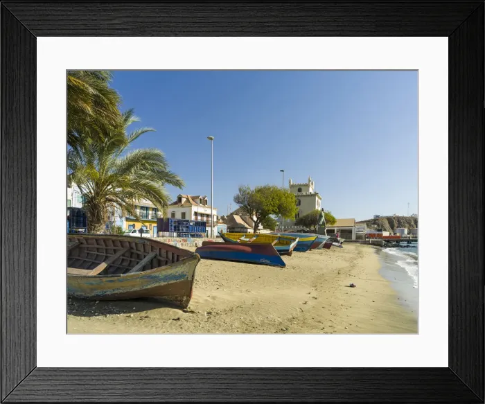 Framed Print : Traditional fishing boats on the beach of the harbor, landmark Torre de Belem in