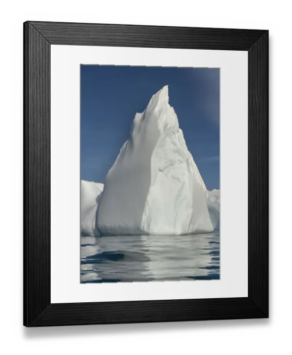 Framed Print : Antarctica, South Georgia Island, Stromness Bay. Iceberg reflects in ocean