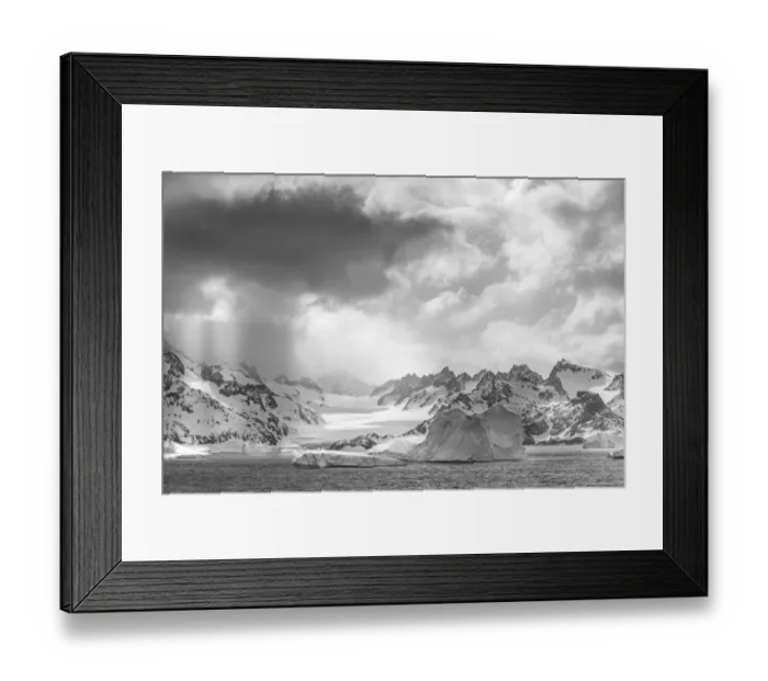 Framed Print : Antarctica, South Georgia Island. Sunbeams light up icebergs and mountains Framed Print : Antarctica, South Georgia Island. Sunbeams light up icebergs and mountains