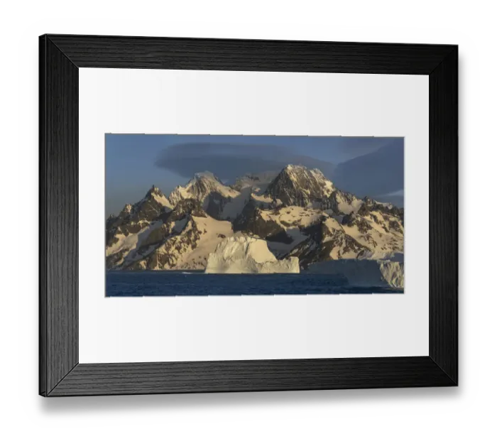 Framed Print : Antarctica, South Georgia Island, Coopers Bay. Icebergs and mountains at sunrise