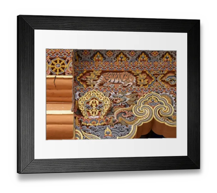Framed Print : Bhutan. Traditional hand painted and carved wooden architectural detail with tiger Framed Print : Bhutan. Traditional hand painted and carved wooden architectural detail with tiger