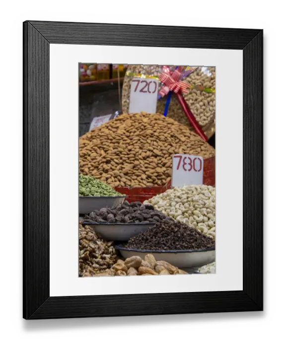 Framed Print : India, Delhi, Old Delhi. Old Delhi street market. Assorted nuts, spices and snacks Framed Print : India, Delhi, Old Delhi. Old Delhi street market. Assorted nuts, spices and snacks