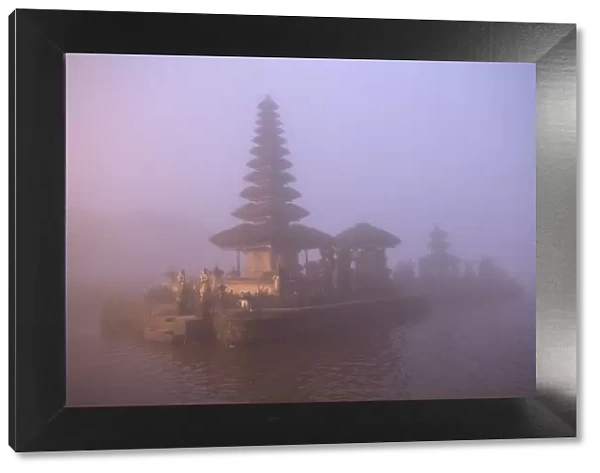 Indonesia, Bali. Foggy sunset on Pura Ulun Danu temple on Lake Bratan