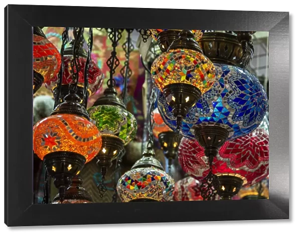 Oman, capital city of Muscat, Muttrah Souk. Typical colorful glass lamps on display at