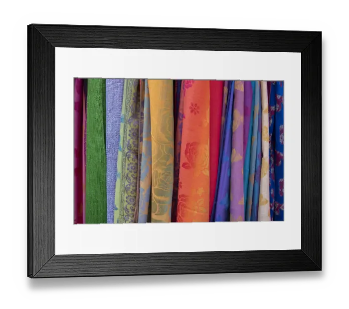 Framed Print : Singapore, Chinatown. Detail of typical textile souvenir scarves
