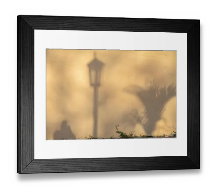 Framed Print : Early morning shadow of a man and lamppost and plant on house wall in Trinidad, Cuba Framed Print : Early morning shadow of a man and lamppost and plant on house wall in Trinidad, Cuba