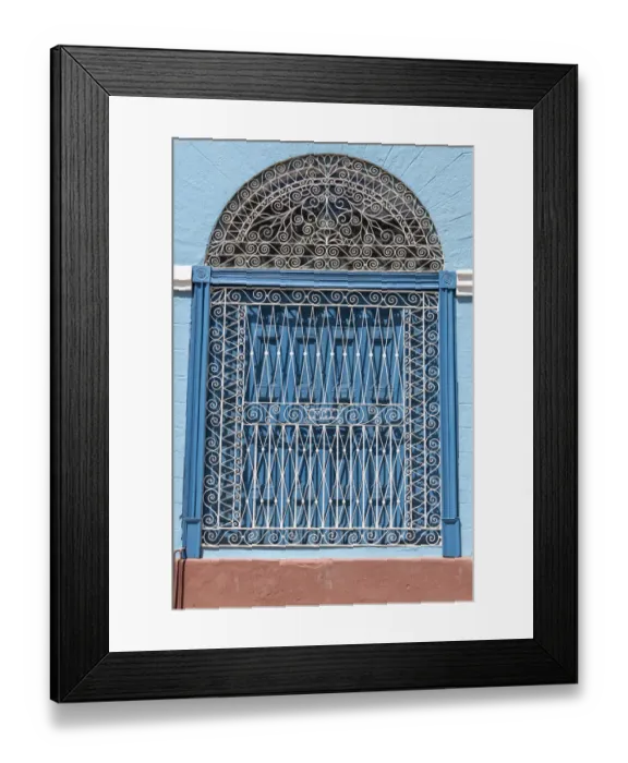 Framed Print : Ornate wrought iron covering on blue wooden window shutters, Trinidad, Cuba Framed Print : Ornate wrought iron covering on blue wooden window shutters, Trinidad, Cuba