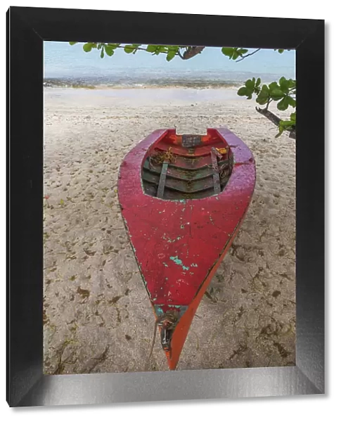 Caribbean, Grenada, Island of Carriacou. Wooden fishing boat on beach