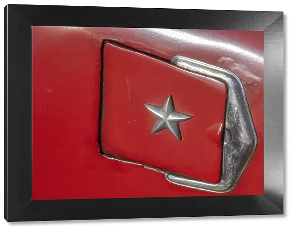 Detail of gasoline tank door with star on classic American car in Vieja, old Habana