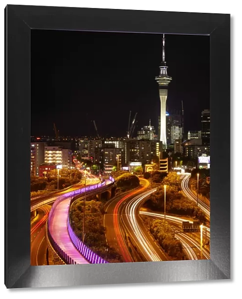 Motorways, Lightpath cycleway, and Skytower at night, Auckland, North Island, New Zealand