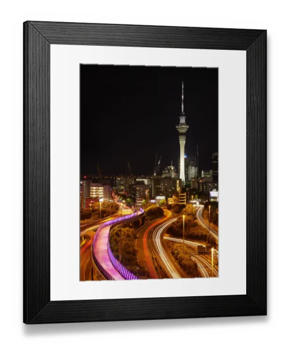 Framed Print : Motorways, Lightpath cycleway, and Skytower at night, Auckland, North Island, New Zealand Framed Print : Motorways, Lightpath cycleway, and Skytower at night, Auckland, North Island, New Zealand