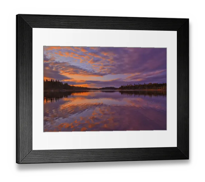 Framed Print : Canada, Ontario, Kenora District. Forest autumn colors reflect on Middle Lake at sunrise