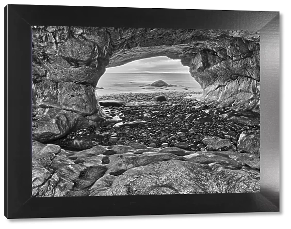Canada, Newfoundland, The Arches Provincial Park, Rock cave on shore of Gulf of St