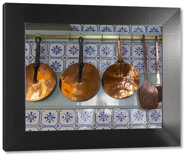 France, Giverny. Copper utensils in kitchen of Monets house