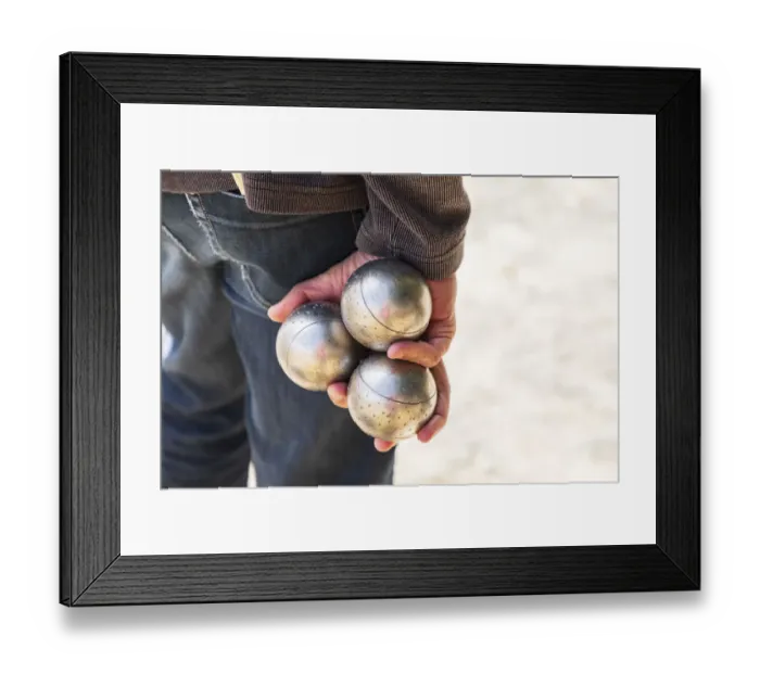 Framed Print : Europe, France, Haute-Vienne, Limoges. Man playing boules in a park in Limoges Framed Print : Europe, France, Haute-Vienne, Limoges. Man playing boules in a park in Limoges