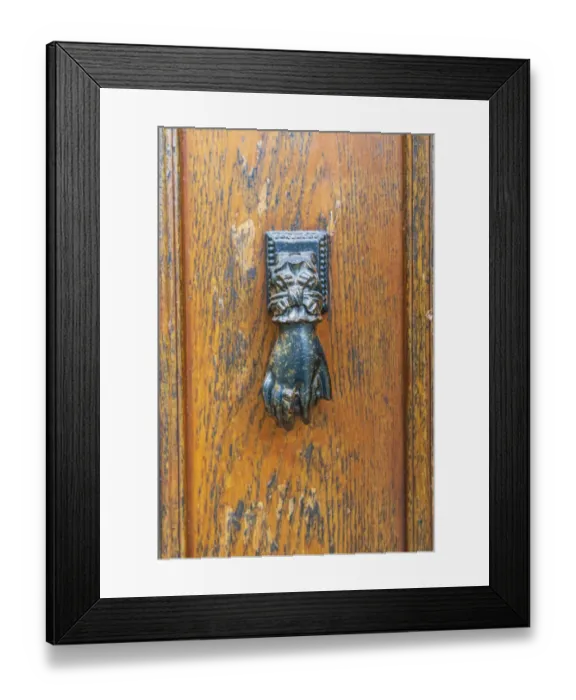 Framed Print : Europe, France, Dordogne, Hautefort. A metal door knocker in the shape of a hand in