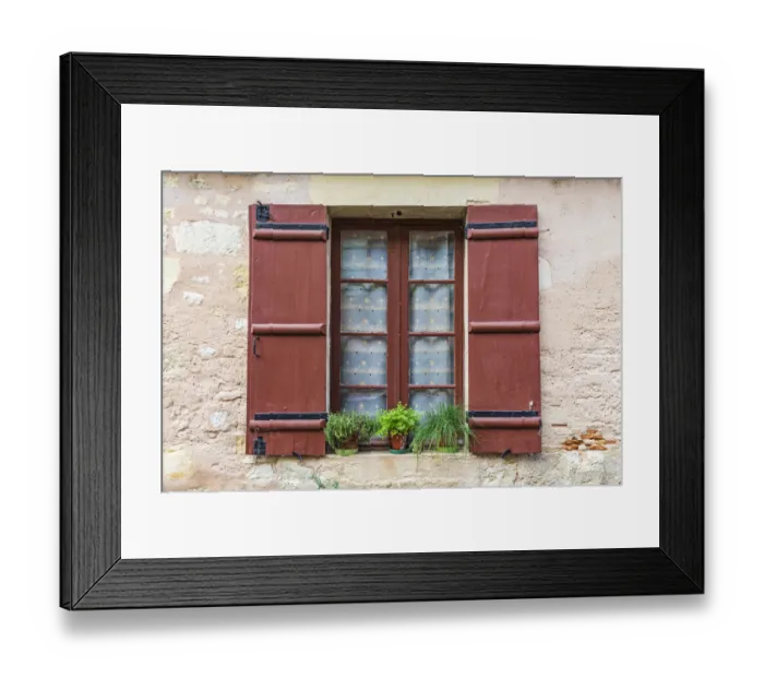 Framed Print : Europe, France, Dordogne, Hautefort. A brown shuttered window on a house in the town of Framed Print : Europe, France, Dordogne, Hautefort. A brown shuttered window on a house in the town of