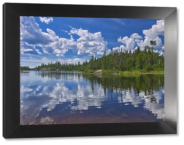 Canada, Ontario, Obatanga Provincial Park, Clouds reflected in Burnfield Lake