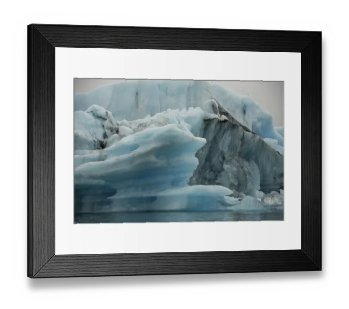 Framed Print : Icebergs from the Jokulsarlon glacier drift in Jokulsarlon lagoon in Iceland Framed Print : Icebergs from the Jokulsarlon glacier drift in Jokulsarlon lagoon in Iceland