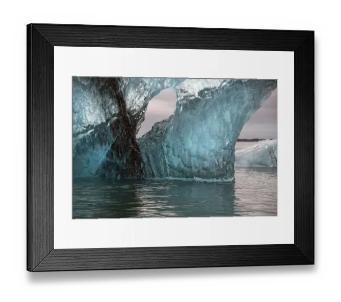 Framed Print : Icebergs from the Jokulsarlon glacier drift in Jokulsarlon lagoon in Iceland Framed Print : Icebergs from the Jokulsarlon glacier drift in Jokulsarlon lagoon in Iceland