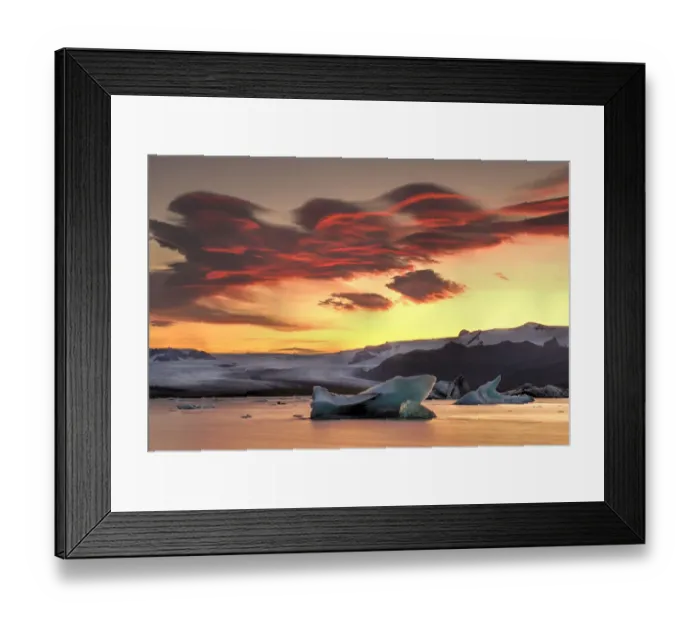 Framed Print : Icebergs from the Jokulsarlon glacier adrift in sunset in Jokulsarlon lagoon in Iceland