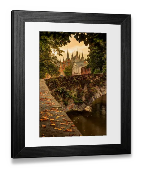 Framed Print : Fall leaf strewn bridge over a canal in Bruges, Belgium Framed Print : Fall leaf strewn bridge over a canal in Bruges, Belgium