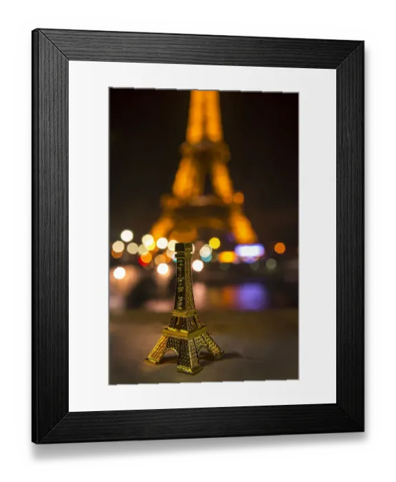 Framed Print : A souvenir Eiffel Tower on the wall of the Seine River across from the real thing Framed Print : A souvenir Eiffel Tower on the wall of the Seine River across from the real thing