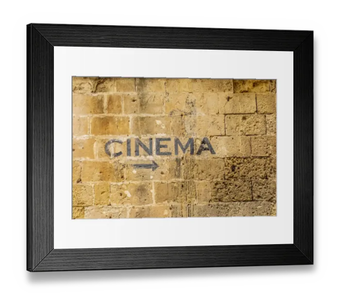 Framed Print : Italy, Basilicata, Province of Matera, Matera. Sign on a wall pointing to a cinema