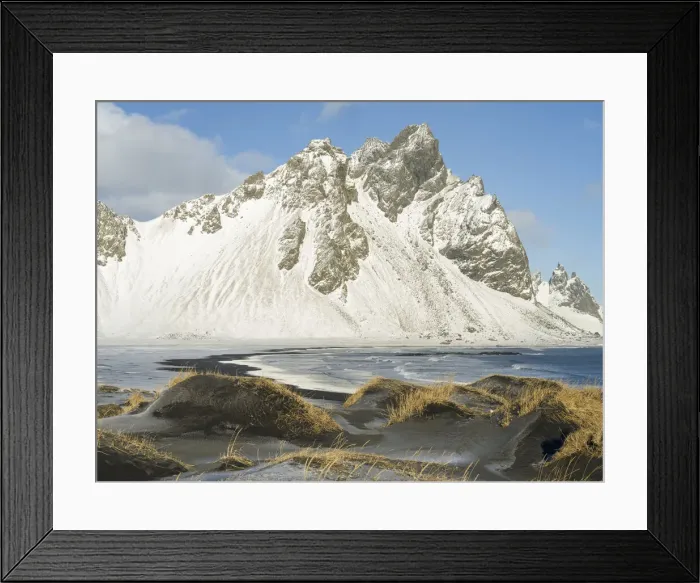 Framed Print : Coastal landscape with dunes at iconic Stokksnes during winter and stormy conditions Framed Print : Coastal landscape with dunes at iconic Stokksnes during winter and stormy conditions