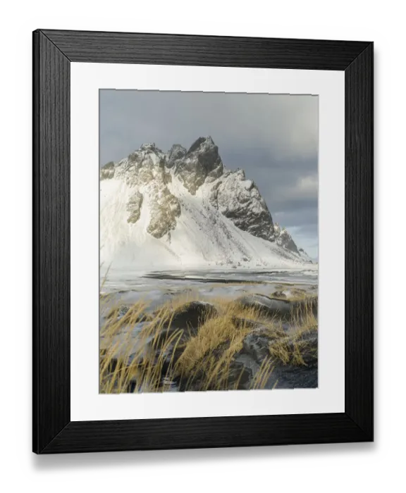 Framed Print : Coastal landscape with dunes at iconic Stokksnes during winter and stormy conditions Framed Print : Coastal landscape with dunes at iconic Stokksnes during winter and stormy conditions