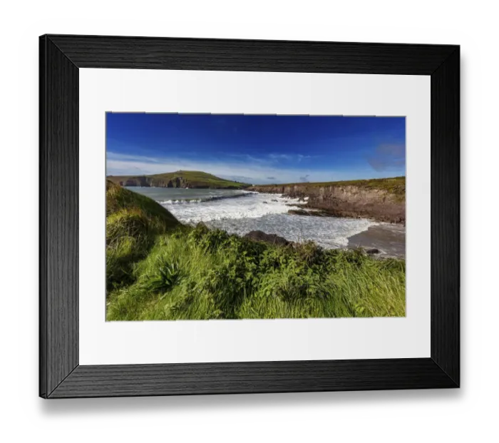 Framed Print : Waves crash into cliffs at Binn Ban Beach near Dingle, Ireland