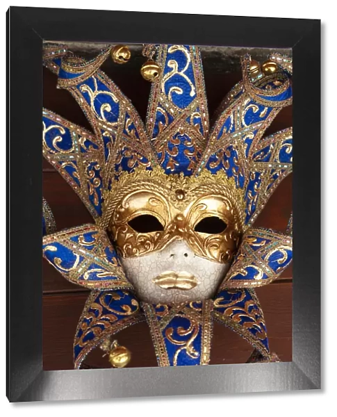 Italy, Venice. Carnival mask on display