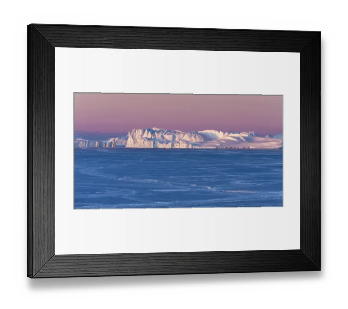 Framed Print : Sunrise during winter at the Ilulissat Fjord, located in the Disko Bay in West Greenland Framed Print : Sunrise during winter at the Ilulissat Fjord, located in the Disko Bay in West Greenland