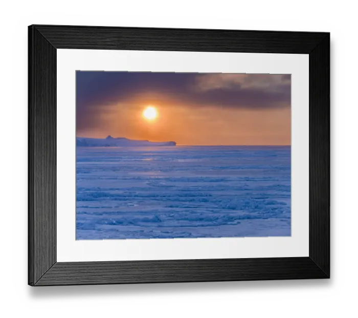 Framed Print : Sunset during winter at the Ilulissat Fjord, located in the Disko Bay in West Greenland Framed Print : Sunset during winter at the Ilulissat Fjord, located in the Disko Bay in West Greenland