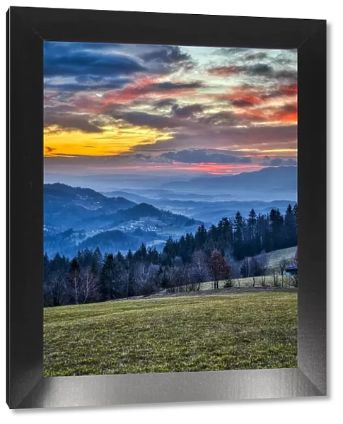 Slovenia, Poljane Sora Valley, hillside near Gorenja Vas in early morning light