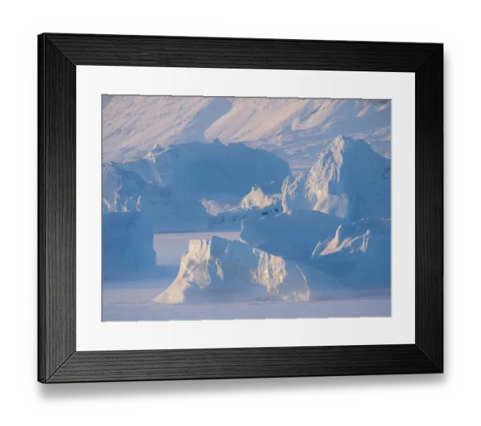Framed Print : Icebergs frozen into the sea ice of the Uummannaq Fjord System during winter
