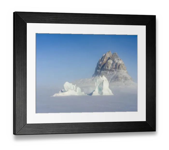 Framed Print : Icebergs frozen into the sea ice of the Uummannaq Fjord System during winter