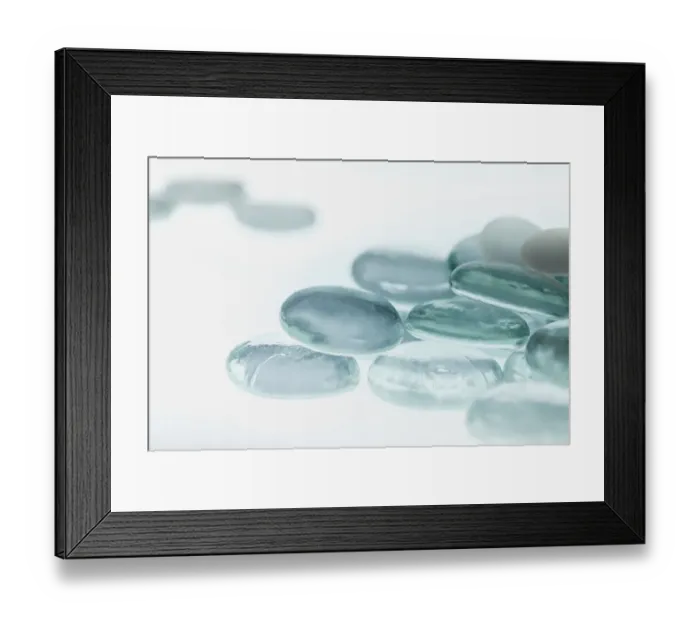 Framed Print : Clear Glass Pebbles with light