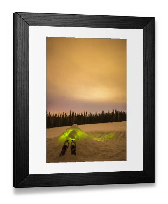 Framed Print : USA, Alaska, Fairbanks. Quinzhee snow hut with snowshoes and poles