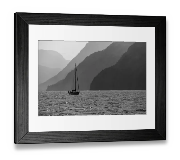 Framed Print : USA, Alaska, Tongass National Forest. B&W of sailboat in Lisianski Inlet Framed Print : USA, Alaska, Tongass National Forest. B&W of sailboat in Lisianski Inlet